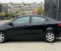 Чорний Кіа Ріо, об'ємом двигуна 1.4 л та пробігом 202 тис. км за 6900 $, фото 1 на Automoto.ua