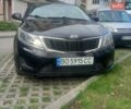 Черный Киа Рио, объемом двигателя 1.4 л и пробегом 213 тыс. км за 8700 $, фото 1 на Automoto.ua