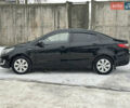 Черный Киа Рио, объемом двигателя 1.4 л и пробегом 155 тыс. км за 7500 $, фото 6 на Automoto.ua