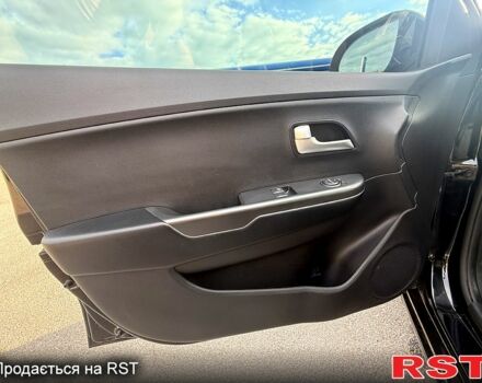 Черный Киа Рио, объемом двигателя 1.4 л и пробегом 74 тыс. км за 9100 $, фото 5 на Automoto.ua