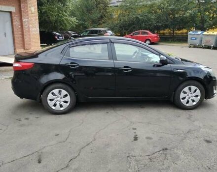 Чорний Кіа Ріо, об'ємом двигуна 1.4 л та пробігом 123 тис. км за 7600 $, фото 3 на Automoto.ua