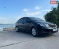 Чорний Кіа Ріо, об'ємом двигуна 1.4 л та пробігом 178 тис. км за 7800 $, фото 2 на Automoto.ua