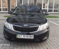 Чорний Кіа Ріо, об'ємом двигуна 1.4 л та пробігом 80 тис. км за 8700 $, фото 1 на Automoto.ua