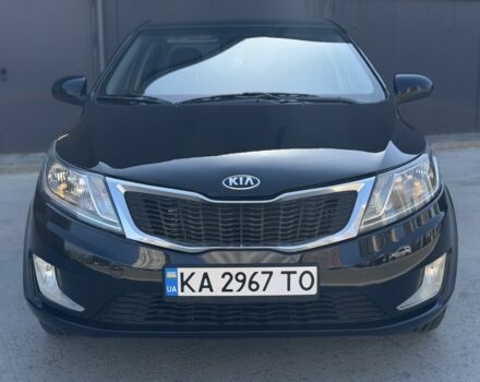 Чорний Кіа Ріо, об'ємом двигуна 1.4 л та пробігом 201 тис. км за 6948 $, фото 7 на Automoto.ua