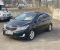 Чорний Кіа Ріо, об'ємом двигуна 1.6 л та пробігом 252 тис. км за 3650 $, фото 1 на Automoto.ua