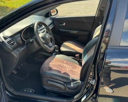 Чорний Кіа Ріо, об'ємом двигуна 1.4 л та пробігом 158 тис. км за 8300 $, фото 11 на Automoto.ua