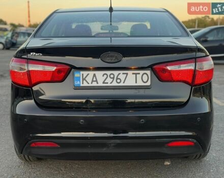 Черный Киа Рио, объемом двигателя 1.4 л и пробегом 201 тыс. км за 6900 $, фото 3 на Automoto.ua