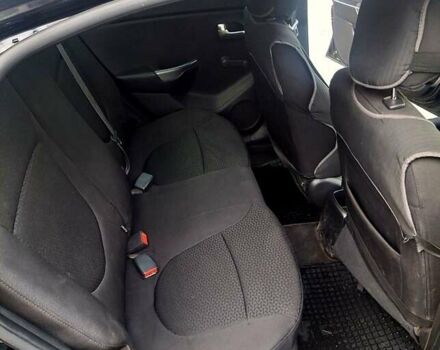 Черный Киа Рио, объемом двигателя 1.4 л и пробегом 197 тыс. км за 7000 $, фото 7 на Automoto.ua