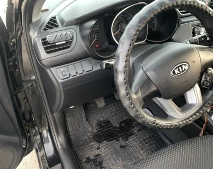 Чорний Кіа Ріо, об'ємом двигуна 1.4 л та пробігом 190 тис. км за 5500 $, фото 5 на Automoto.ua