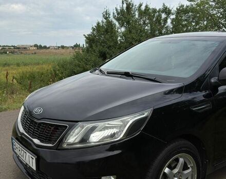 Чорний Кіа Ріо, об'ємом двигуна 1.6 л та пробігом 104 тис. км за 8500 $, фото 16 на Automoto.ua