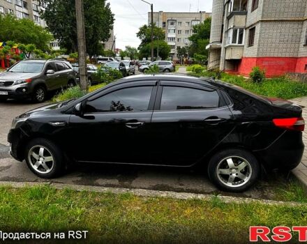 Черный Киа Рио, объемом двигателя 1.6 л и пробегом 330 тыс. км за 5700 $, фото 3 на Automoto.ua