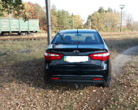 Чорний Кіа Ріо, об'ємом двигуна 1.4 л та пробігом 77 тис. км за 8500 $, фото 1 на Automoto.ua