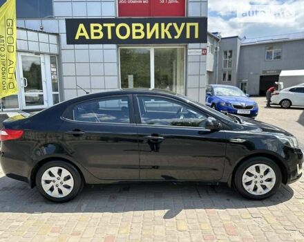 Черный Киа Рио, объемом двигателя 1.4 л и пробегом 90 тыс. км за 8999 $, фото 1 на Automoto.ua