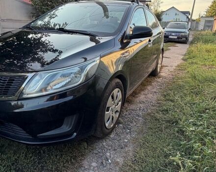 Чорний Кіа Ріо, об'ємом двигуна 1.4 л та пробігом 73 тис. км за 8900 $, фото 4 на Automoto.ua
