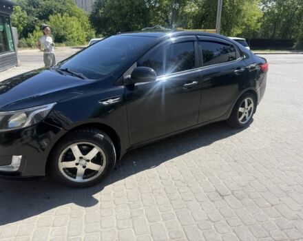 Черный Киа Рио, объемом двигателя 1.6 л и пробегом 330 тыс. км за 5500 $, фото 5 на Automoto.ua
