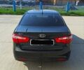Черный Киа Рио, объемом двигателя 1.4 л и пробегом 125 тыс. км за 6700 $, фото 4 на Automoto.ua