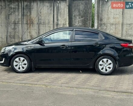 Черный Киа Рио, объемом двигателя 1.4 л и пробегом 155 тыс. км за 7500 $, фото 6 на Automoto.ua