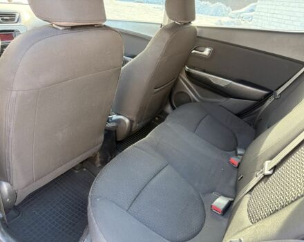 Чорний Кіа Ріо, об'ємом двигуна 1.6 л та пробігом 270 тис. км за 6499 $, фото 12 на Automoto.ua