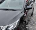Чорний Кіа Ріо, об'ємом двигуна 1.4 л та пробігом 100 тис. км за 7607 $, фото 1 на Automoto.ua