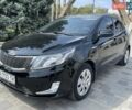 Чорний Кіа Ріо, об'ємом двигуна 1.6 л та пробігом 127 тис. км за 8300 $, фото 1 на Automoto.ua