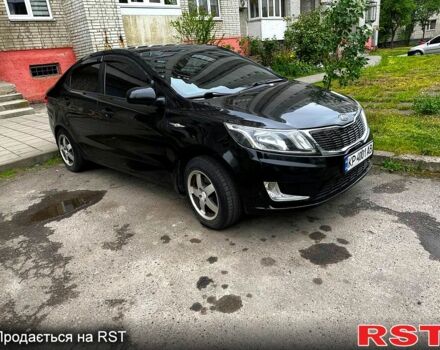 Черный Киа Рио, объемом двигателя 1.6 л и пробегом 330 тыс. км за 5700 $, фото 1 на Automoto.ua