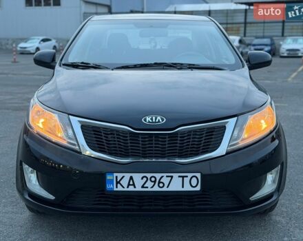 Чорний Кіа Ріо, об'ємом двигуна 1.4 л та пробігом 201 тис. км за 6950 $, фото 7 на Automoto.ua