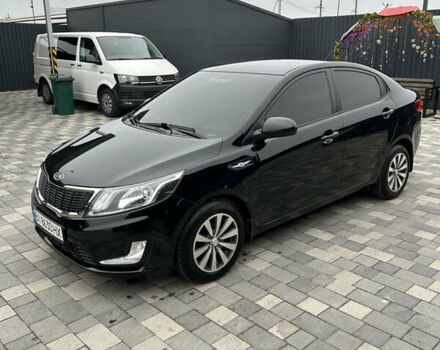 Черный Киа Рио, объемом двигателя 1.4 л и пробегом 111 тыс. км за 7500 $, фото 1 на Automoto.ua
