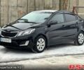 Черный Киа Рио, объемом двигателя 1.4 л и пробегом 155 тыс. км за 7500 $, фото 1 на Automoto.ua