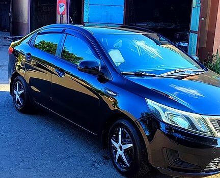 Черный Киа Рио, объемом двигателя 1.4 л и пробегом 120 тыс. км за 7700 $, фото 5 на Automoto.ua