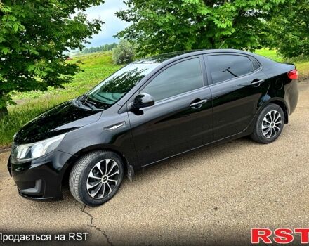 Черный Киа Рио, объемом двигателя 1.4 л и пробегом 131 тыс. км за 7500 $, фото 1 на Automoto.ua
