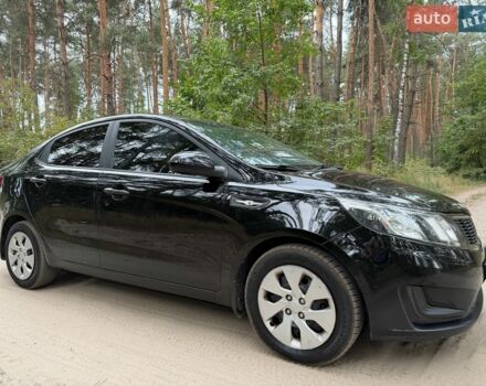 Чорний Кіа Ріо, об'ємом двигуна 1.4 л та пробігом 193 тис. км за 6300 $, фото 1 на Automoto.ua