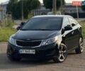 Черный Киа Рио, объемом двигателя 1.4 л и пробегом 99 тыс. км за 7750 $, фото 1 на Automoto.ua