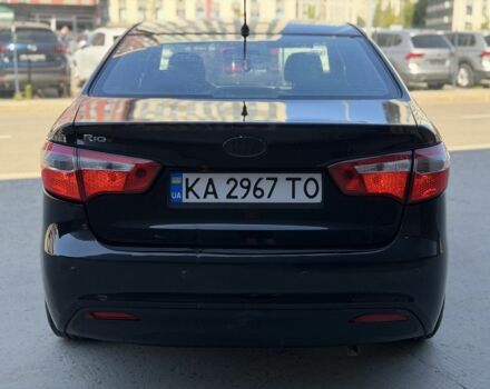 Чорний Кіа Ріо, об'ємом двигуна 1.4 л та пробігом 201 тис. км за 6948 $, фото 3 на Automoto.ua