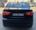 Чорний Кіа Ріо, об'ємом двигуна 1.4 л та пробігом 201 тис. км за 6948 $, фото 3 на Automoto.ua