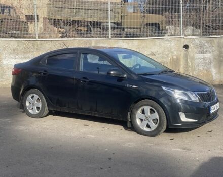 Чорний Кіа Ріо, об'ємом двигуна 1.6 л та пробігом 252 тис. км за 3650 $, фото 3 на Automoto.ua