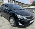 Чорний Кіа Ріо, об'ємом двигуна 1.6 л та пробігом 127 тис. км за 8300 $, фото 5 на Automoto.ua