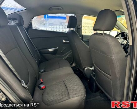 Черный Киа Рио, объемом двигателя 1.4 л и пробегом 155 тыс. км за 7500 $, фото 11 на Automoto.ua