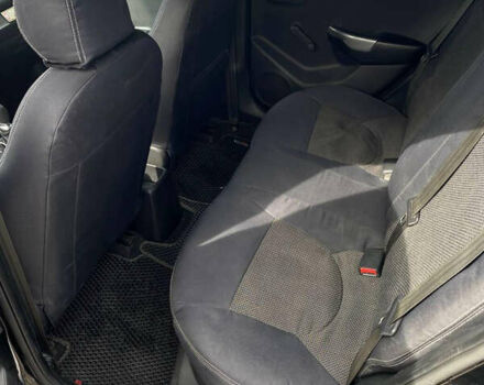 Чорний Кіа Ріо, об'ємом двигуна 1.4 л та пробігом 100 тис. км за 5999 $, фото 7 на Automoto.ua