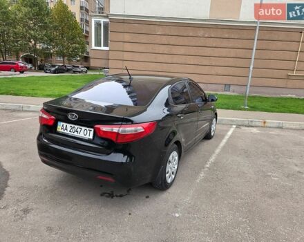 Чорний Кіа Ріо, об'ємом двигуна 1.6 л та пробігом 215 тис. км за 7500 $, фото 2 на Automoto.ua