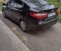 Черный Киа Рио, объемом двигателя 1.4 л и пробегом 140 тыс. км за 6800 $, фото 2 на Automoto.ua