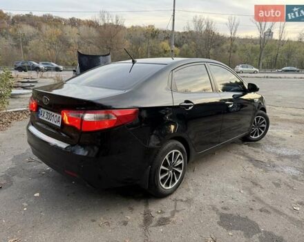 Чорний Кіа Ріо, об'ємом двигуна 1.59 л та пробігом 154 тис. км за 7600 $, фото 4 на Automoto.ua