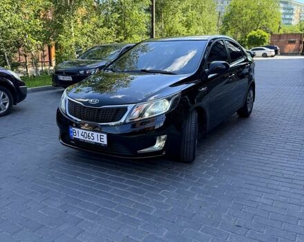Чорний Кіа Ріо, об'ємом двигуна 1.4 л та пробігом 103 тис. км за 7800 $, фото 2 на Automoto.ua