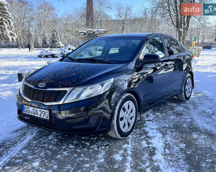 Чорний Кіа Ріо, об'ємом двигуна 1.4 л та пробігом 245 тис. км за 7600 $, фото 4 на Automoto.ua