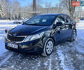 Чорний Кіа Ріо, об'ємом двигуна 1.4 л та пробігом 245 тис. км за 7600 $, фото 4 на Automoto.ua