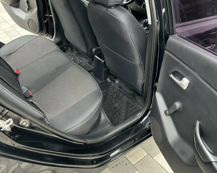 Черный Киа Рио, объемом двигателя 1.4 л и пробегом 111 тыс. км за 7500 $, фото 12 на Automoto.ua