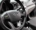 Чорний Кіа Ріо, об'ємом двигуна 1.4 л та пробігом 100 тис. км за 7607 $, фото 4 на Automoto.ua
