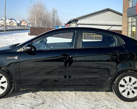 Чорний Кіа Ріо, об'ємом двигуна 1.59 л та пробігом 93 тис. км за 8999 $, фото 6 на Automoto.ua