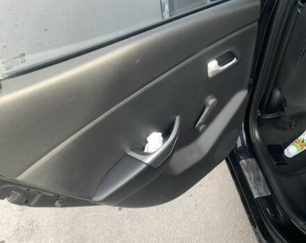 Чорний Кіа Ріо, об'ємом двигуна 1.4 л та пробігом 190 тис. км за 5500 $, фото 13 на Automoto.ua