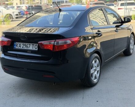 Чорний Кіа Ріо, об'ємом двигуна 1.4 л та пробігом 201 тис. км за 6948 $, фото 4 на Automoto.ua