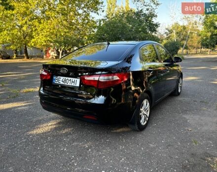 Чорний Кіа Ріо, об'ємом двигуна 1.4 л та пробігом 165 тис. км за 6900 $, фото 3 на Automoto.ua